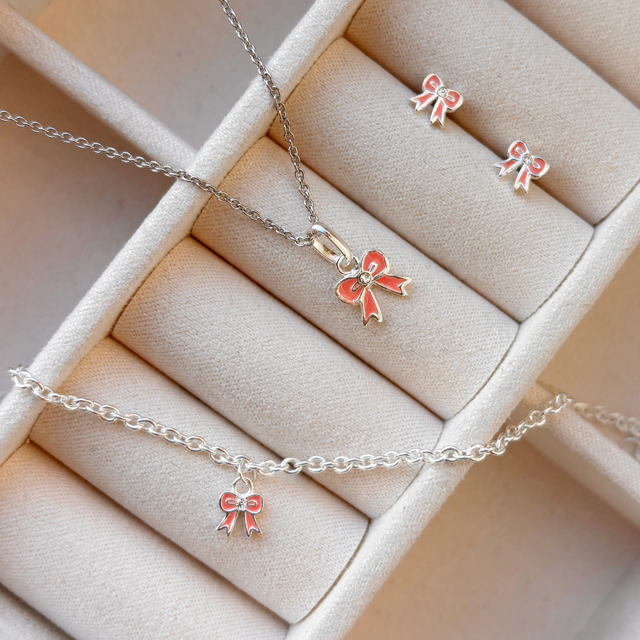 Girls armbånd rosa sløjfe cubic zir. sølv