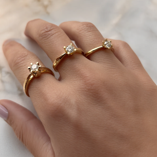 *Kleopatra ring 0,40 H-W/SI 14 kt