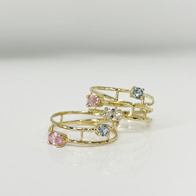 Ring 2 rk. multicolor cubic zir. 8 kt.
