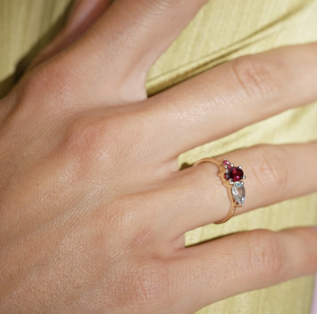 Ring pink/blå topas+rhodolite 8 kt.