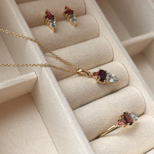 Ring pink/blå topas+rhodolite 8 kt.