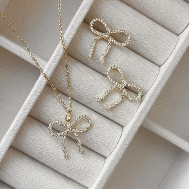 Earsticks bow zir. 925 goldplated