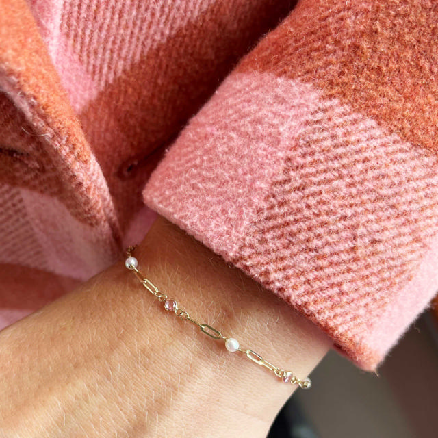 *Armbånd fkp./rosa cubic zir. 17+2cm 9 kt.