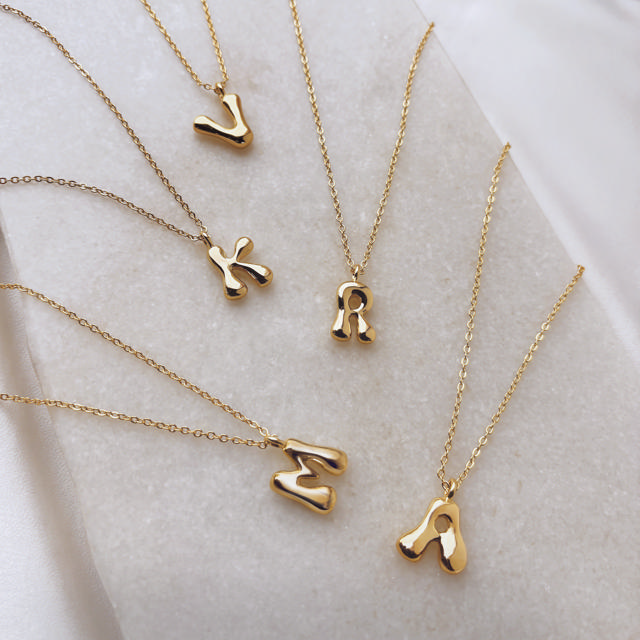 Pendant M brass goldplated